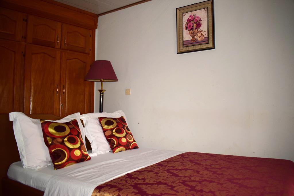 Toundalia Residence Yaoundé Quarto foto