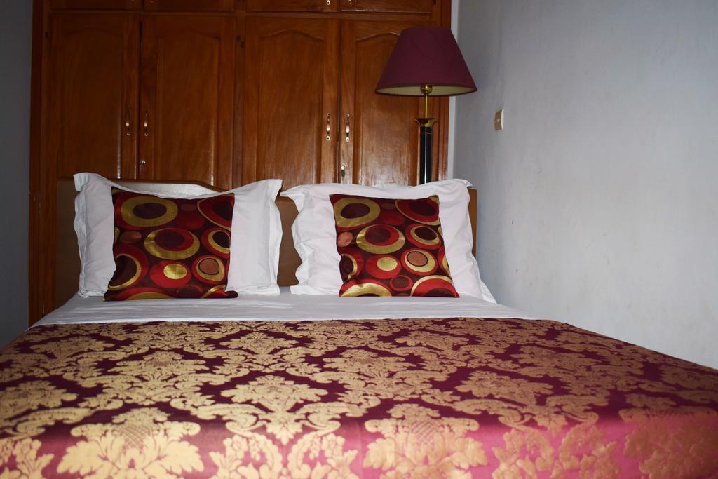 Toundalia Residence Yaoundé Quarto foto