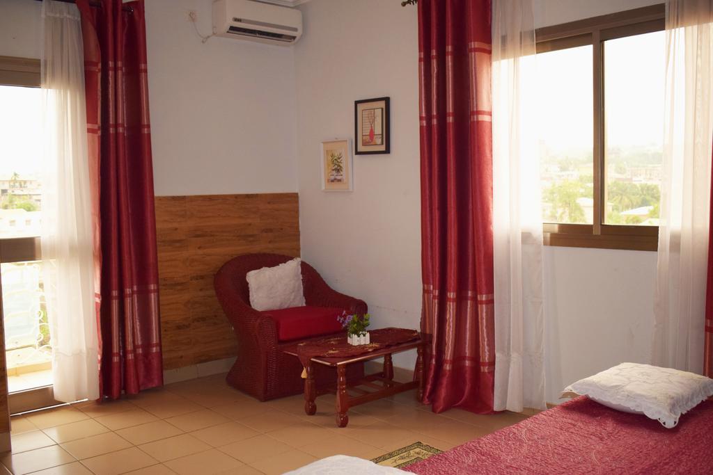Toundalia Residence Yaoundé Quarto foto