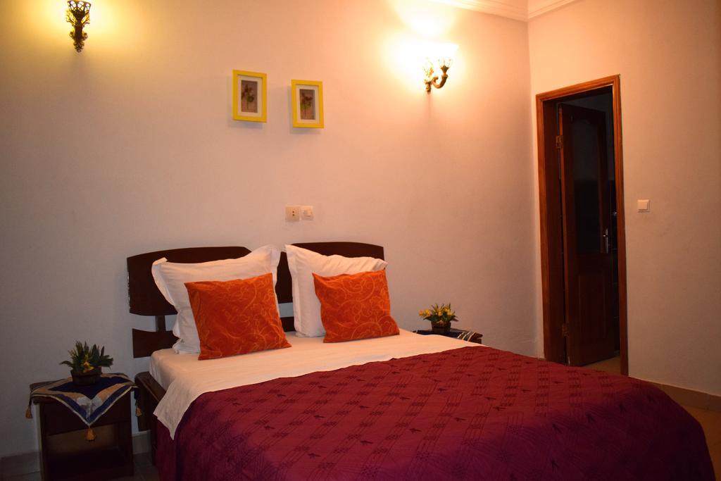 Toundalia Residence Yaoundé Quarto foto