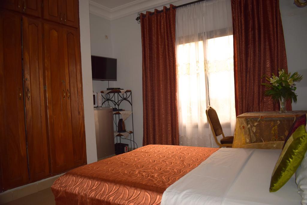 Toundalia Residence Yaoundé Quarto foto